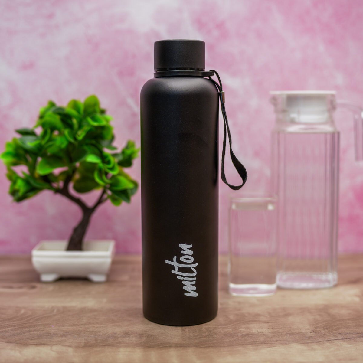 MILTON Caper 1000 Stainless Steel Water Bottle 870 ml, Single Walled, ISI Certified I Leak Proof Lid, Rust Proof I For School, Office, Gym I Black - Image 1